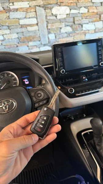 Toyota flip key held inside a Toyota